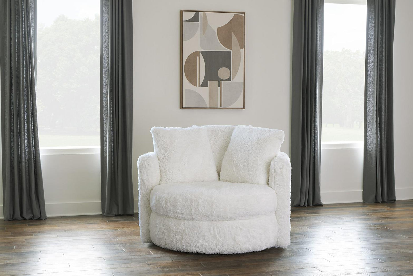 Yakety Yak Natural Swivel Chair